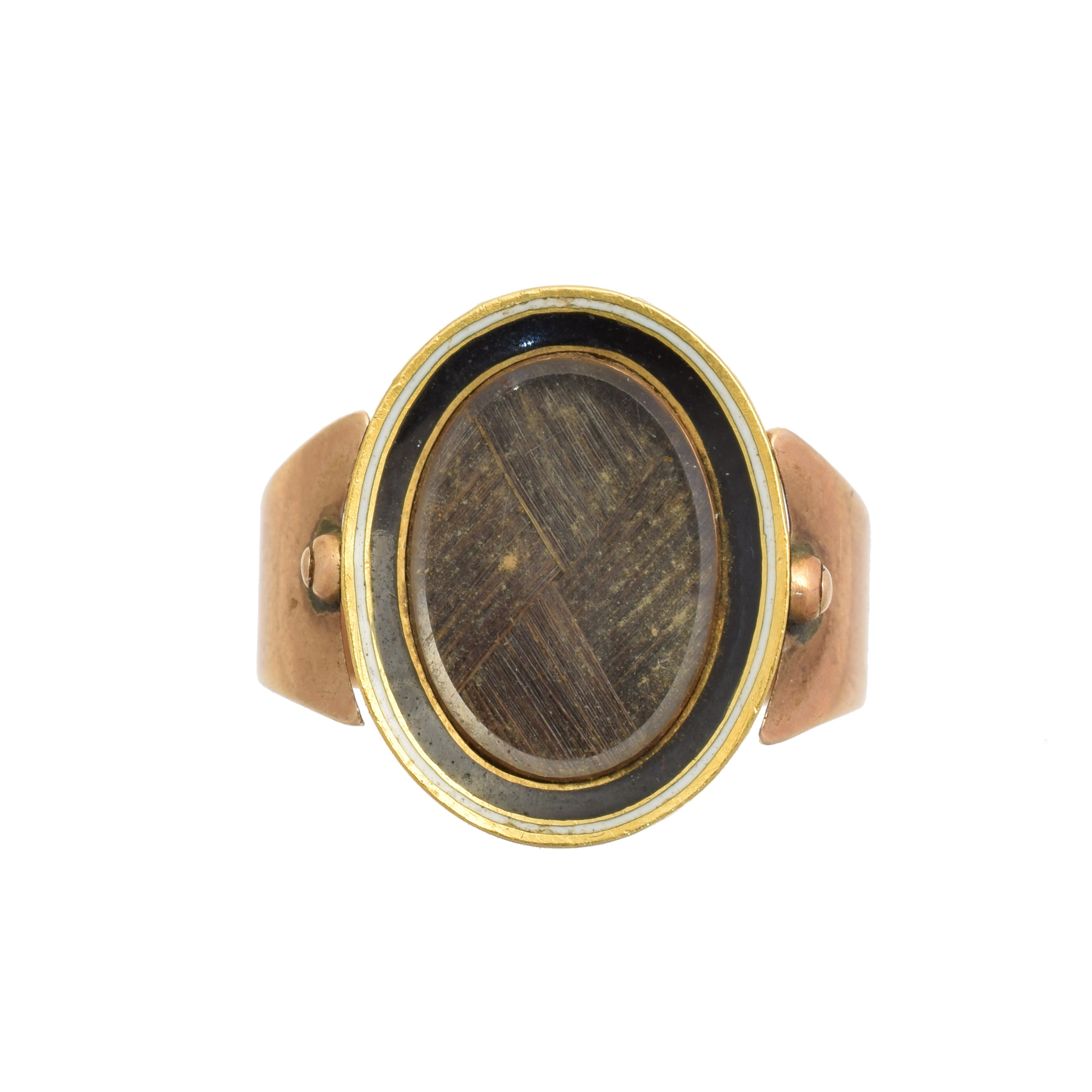 A George III swivel mourning ring, with black and enamel panel inscribed 'Honble Diana Walpole Ob:26 July 1784 Ae: 20' with hair panel to reverse, ring size H, gross weight 5.1g. The Hon. Mrs. Diana Walpole, neé Grosset, married the Hon. Robert Walpole on 8th May 1780. Robert Walpole (1736 - 1810) was the fourth son of Horatio Walpole, 1st Baron Walpole of Wolterton, and nephew of Robert Walpole, 1st Earl of Orford, who is considered the de facto first Prime Minister of Great Britain.