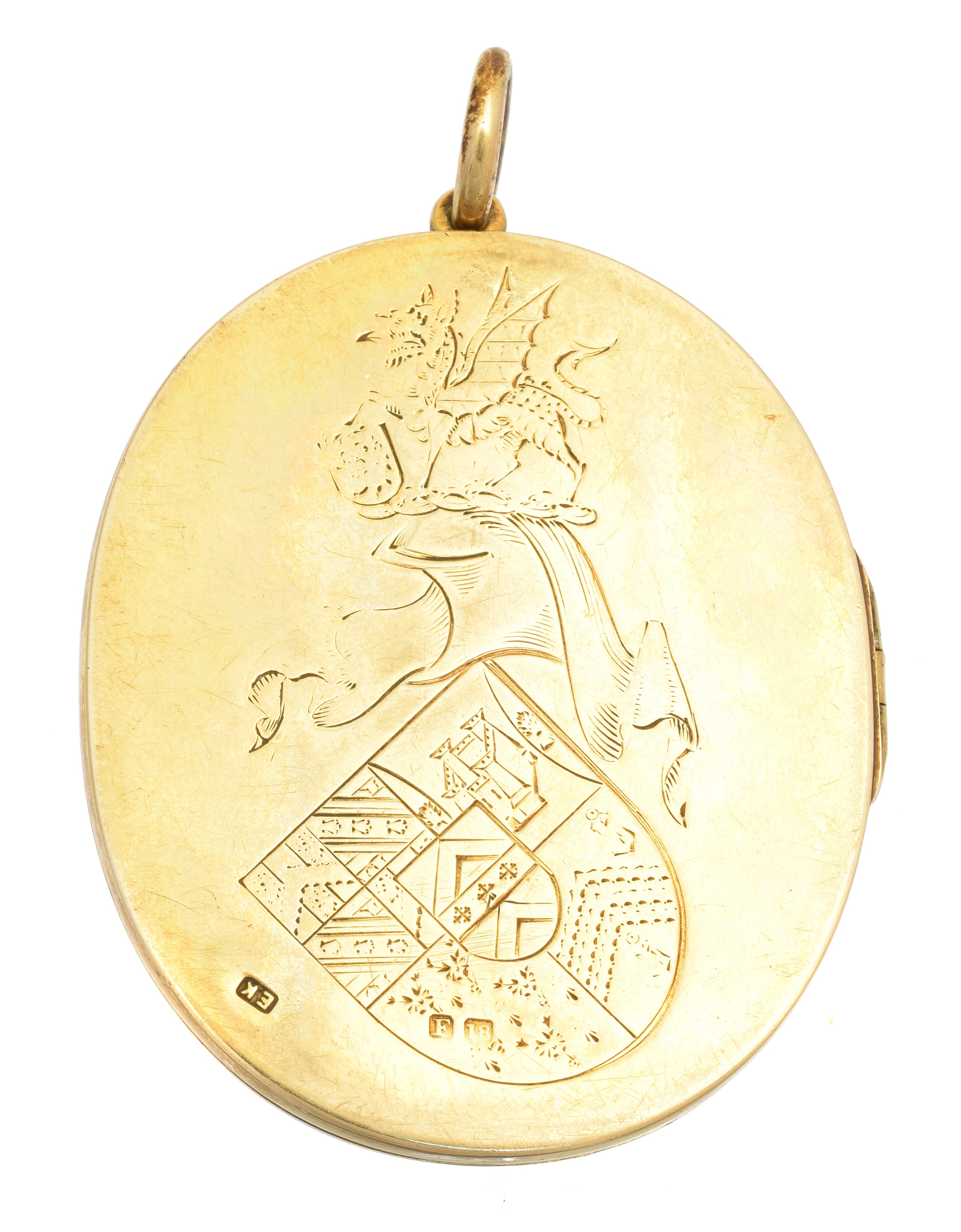 A late Victorian 18ct gold photograph miniature locket, the oval shape hinged locket with engraved with monogram, cartouche and 'Diana' to front, and coat of arms to reverse, the locket opening to reveal a photograph miniature of Diana Caroline Walpole, with inscription reading 'Diana Caroline 2nd daughter and co-heiress of Reginald Robert Walpole, great grandson of Horatio 1st Lord Walpole of Walterton and great great grandson (maternally) of Sir Edward Seymour 8th Duke of Somerset. married XVIII April MDCCCLXXVI to James Boughey Monk Linguard Monk M.A, Trinity College, Cambridge, only child of Richard Boughey Monk Linguard-Monk of Fulshaw Hall, Wilmslow, Cheshire.' hallmarks for EK, London, 1881, length 6.7cm, gross weight 59.7g.