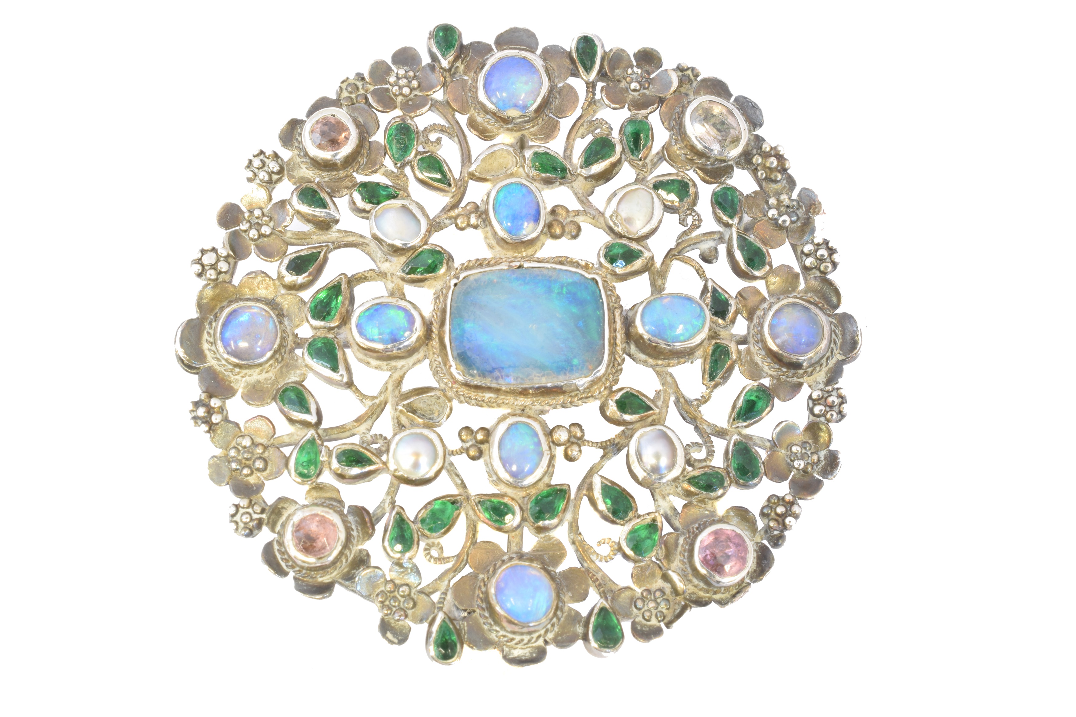 An Arts & Crafts opal and vari gem brooch attributed to Arthur and Georgie Gaskin