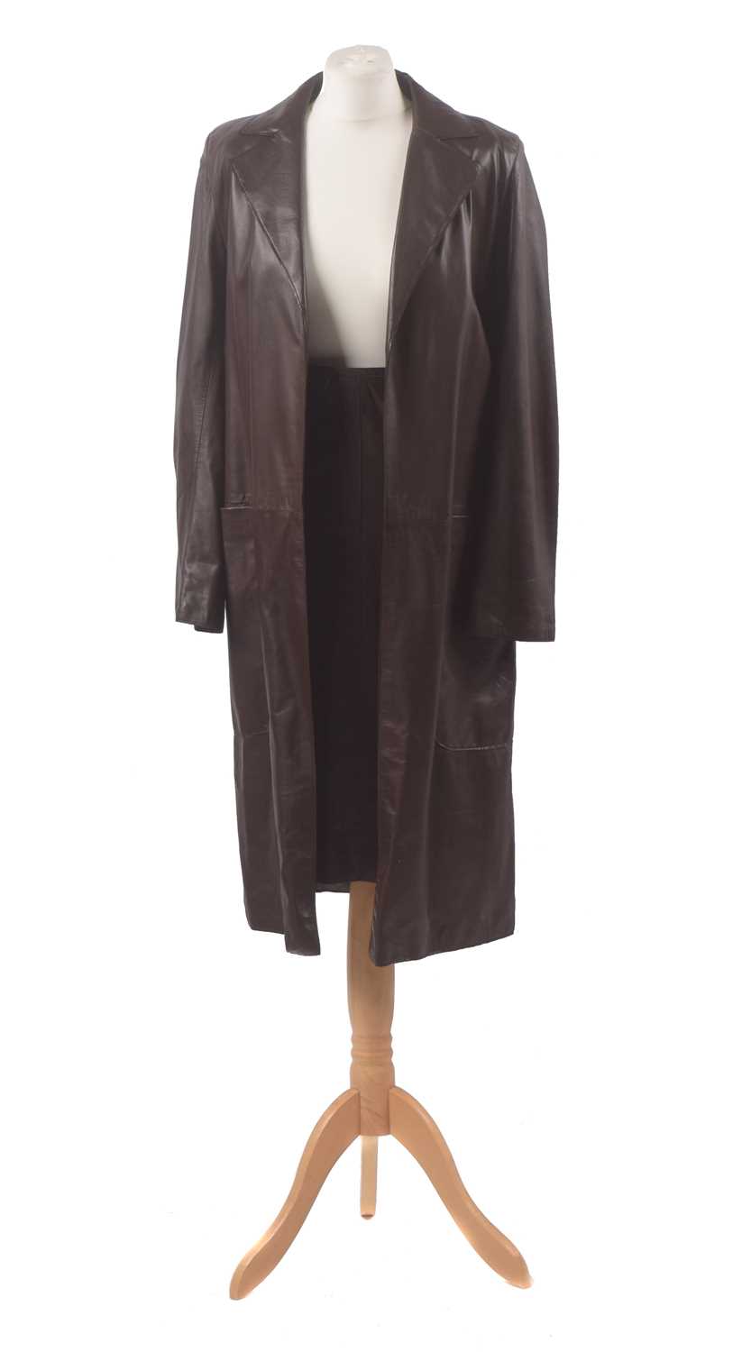 A leather coat and skirt by Mulberry, the brown mid length leather coat with accompanying leather skirt, size 8-12 (2).