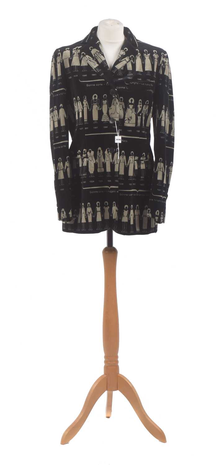 A velvet jacket by Moschino, the black velvet jacket with beige print detailing 20th century fashion, size 14.