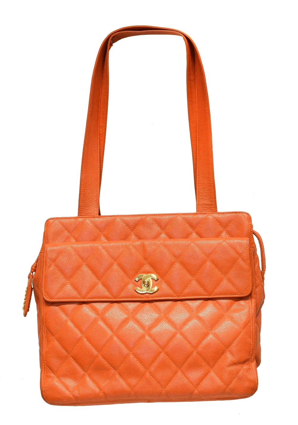 A Chanel Front Pocket Turnlock Tote Shoulder Bag, circa 1996-7, the orange quilted caviar calf leather exterior with orange leather strap and gold tone hardware, serial no. 4112158. With maker's authenticity card. (Qty: 1) 30x25x10cm Sold for £1,049